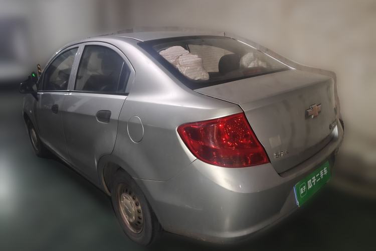 Used Chevrolet Sail 2013 Sedan 1.2L Manual Fashionable Happiness Edition Rear Left 45 Deg
