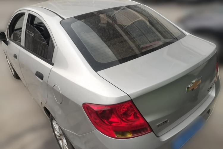 Used Chevrolet Sail 2013 Sedan 1.4L Manual Ideal Happiness Edition Rear Left 45 Deg