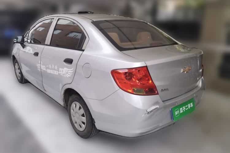 Used Chevrolet Sail 2013 Sedan 1.2L Manual Fashionable Happiness Edition Rear Left 45 Deg