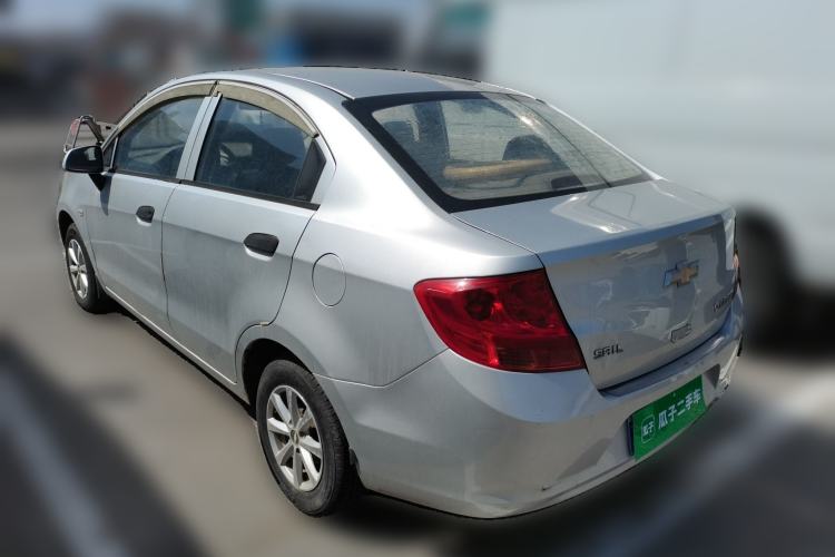 Used Chevrolet Sail 2013 Sedan 1.2L Manual Fashionable Happiness Edition Rear Left 45 Deg