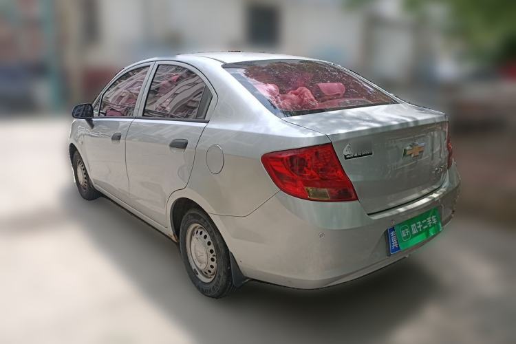 Used Chevrolet Sail 2013 Sedan 1.2L Manual Fashionable Happiness Edition Rear Left 45 Deg