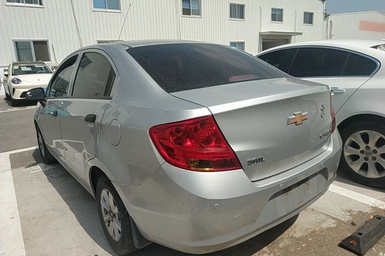 Used Chevrolet Sail 2013 Sedan 1.2L Manual Fashionable Happiness Edition Rear Left 45 Deg