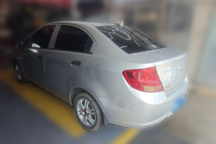 Used Chevrolet Sail 2013 Sedan 1.4L Manual Ideal Edition Rear Left 45 Deg