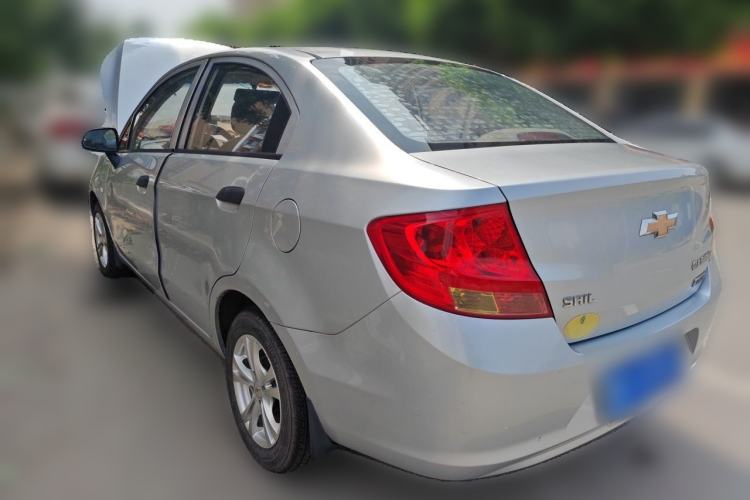 Used Chevrolet Sail 2013 Sedan 1.4L Manual Ideal Edition Rear Left 45 Deg
