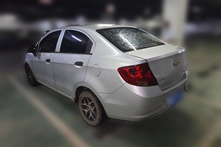 Used Chevrolet Sail 2013 Sedan 1.2L Manual Ideal Edition Rear Left 45 Deg
