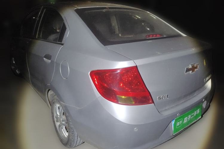 Used Chevrolet Sail 2013 Sedan 1.4L Manual Ideal Happiness Edition Rear Left 45 Deg