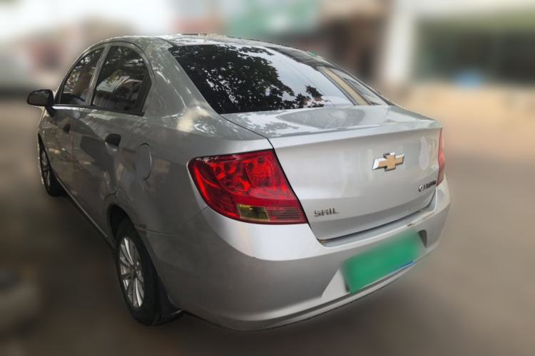 Used Chevrolet Sail 2013 Sedan 1.2L Manual Fashionable Happiness Edition Rear Left 45 Deg