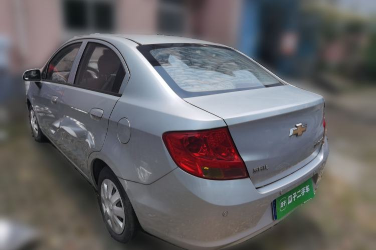 Used Chevrolet Sail 2013 Sedan 1.4L Manual Happiness Edition II Rear Left 45 Deg