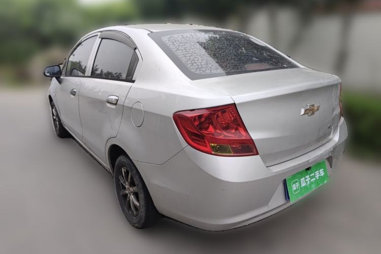 Used Chevrolet Sail 2013 Sedan 1.2L Manual Fashionable Happiness Edition Rear Left 45 Deg