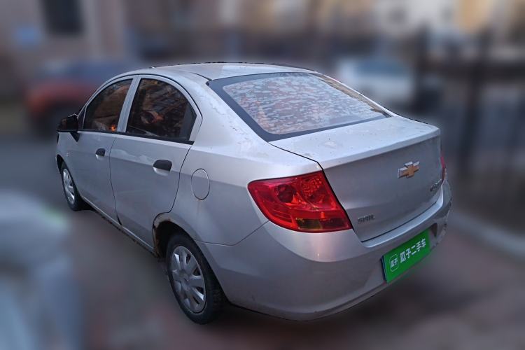 Used Chevrolet Sail 2013 Sedan 1.2L AMT Ideal Edition Rear Left 45 Deg