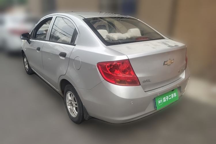 Used Chevrolet Sail 2013 Sedan 1.2L Manual Fashionable Happiness Edition Rear Left 45 Deg
