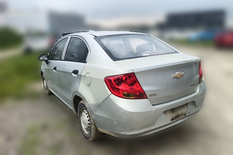 Used Chevrolet Sail 2013 Sedan 1.2L Manual Fashionable Happiness Edition Rear Left 45 Deg