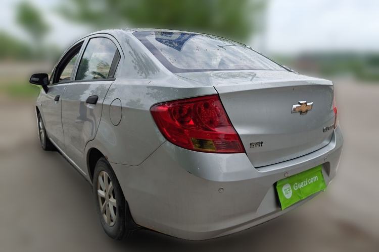 Used Chevrolet Sail 2013 Sedan 1.2L Manual Fashionable Happiness Edition Rear Left 45 Deg