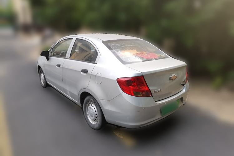 Used Chevrolet Sail 2013 Sedan 1.2L Manual Warm Edition Rear Left 45 Deg