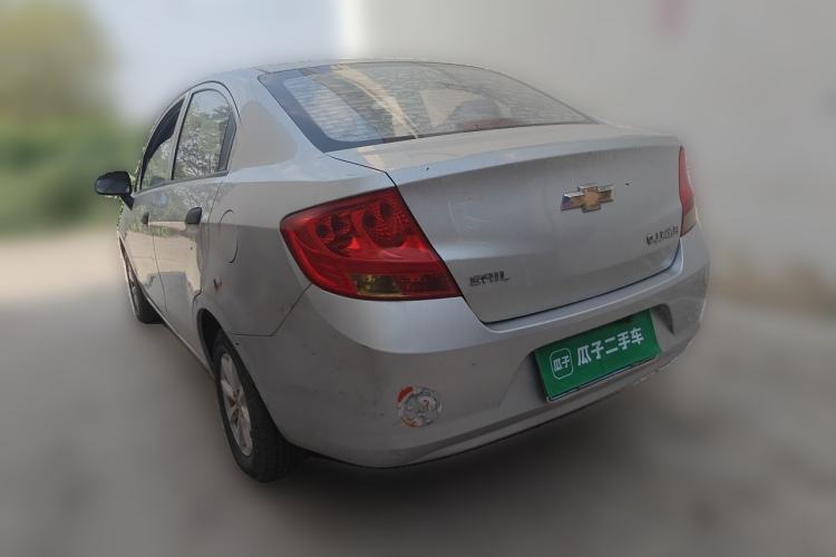Used Chevrolet Sail 2013 Sedan 1.2L Manual Fashionable Happiness Edition Rear Left 45 Deg