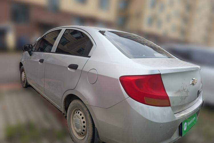 Used Chevrolet Sail 2013 Sedan 1.2L Manual Warm Edition Rear Left 45 Deg