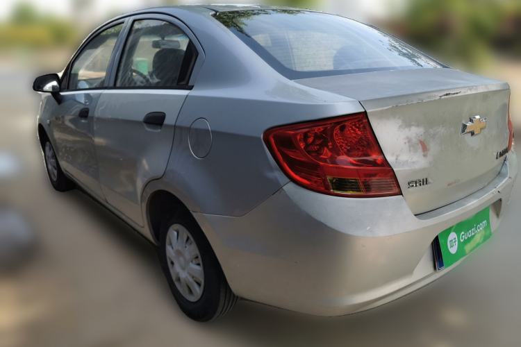 Used Chevrolet Sail 2013 Sedan 1.2L Manual Warm Edition Rear Left 45 Deg