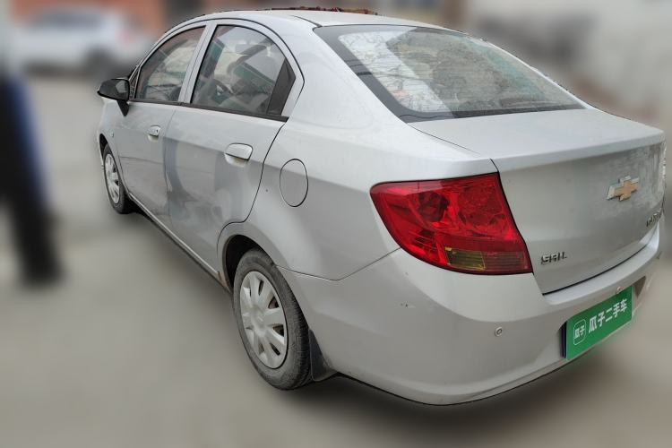 Used Chevrolet Sail 2013 Sedan 1.4L Manual - Youyi Happiness Edition Rear Left 45 Deg