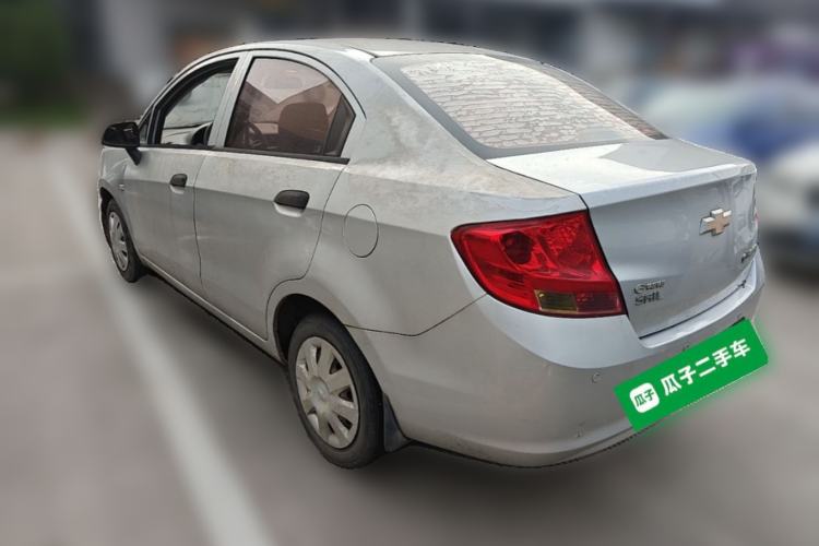 Used Chevrolet Sail 2013 Sedan 1.4L Manual Ideal Edition Rear Left 45 Deg