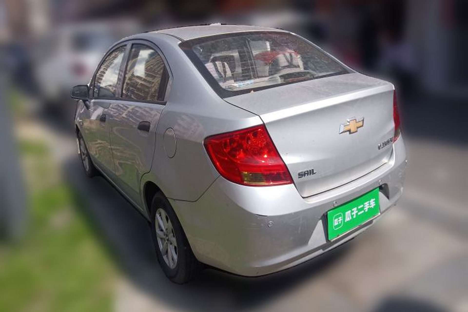 Used Chevrolet Sail 2013 Sedan 1.2L Manual Warm Edition Rear Left 45 Deg