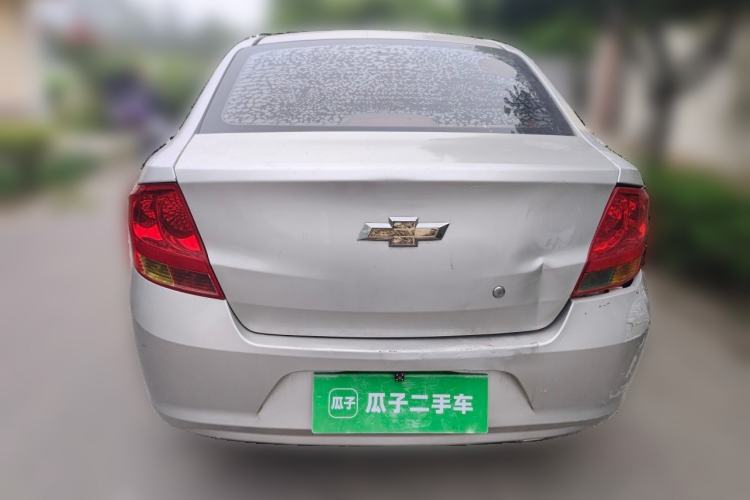 Used Chevrolet Sail 2013 Sedan 1.2L Manual Fashionable Happiness Edition Rear