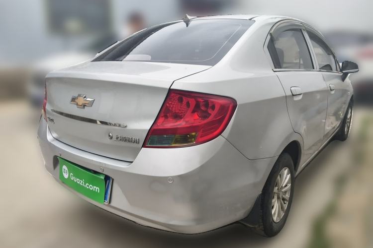 Used Chevrolet Sail 2013 Sedan 1.2L Manual Fashionable Happiness Edition Rear Right 45 Deg