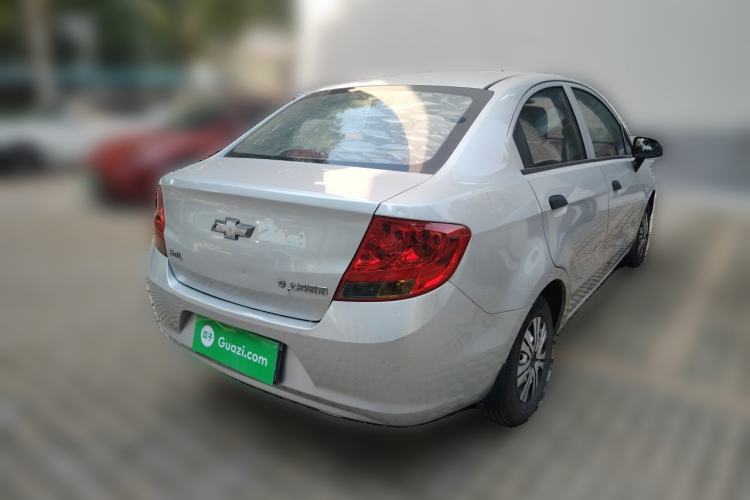 Used Chevrolet Sail 2013 Sedan 1.2L Manual Fashionable Happiness Edition Rear Right 45 Deg
