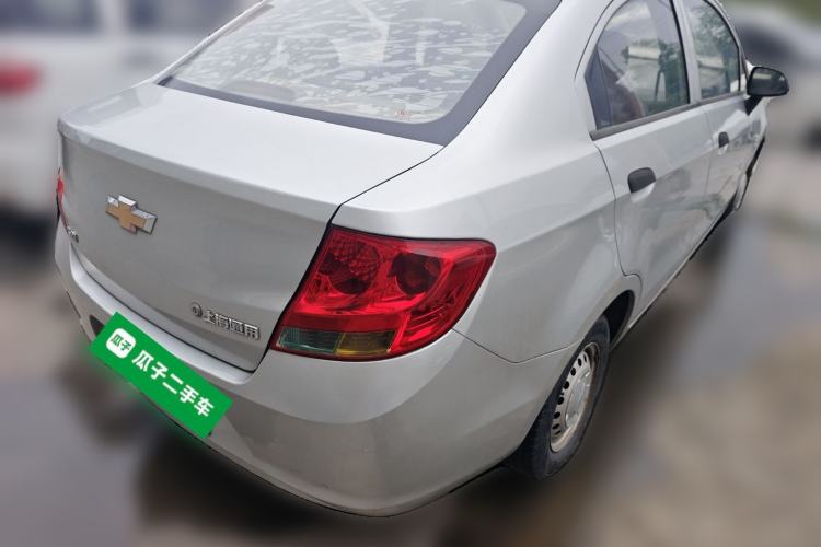 Used Chevrolet Sail 2013 Sedan 1.2L Manual Warm Edition Rear Right 45 Deg