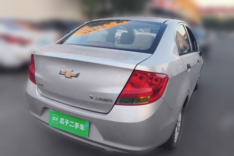 Used Chevrolet Sail 2013 Sedan 1.2L Manual Happiness Edition Rear Right 45 Deg