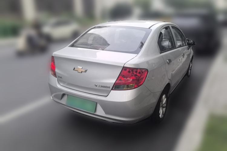 Used Chevrolet Sail 2013 Sedan 1.2L Manual Fashionable Happiness Edition Rear Right 45 Deg