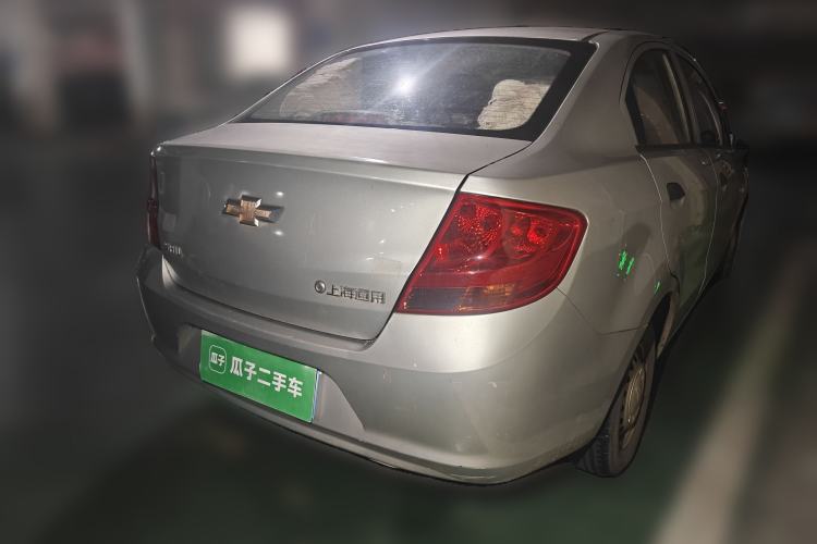 Used Chevrolet Sail 2013 Sedan 1.2L Manual Fashionable Happiness Edition Rear Right 45 Deg