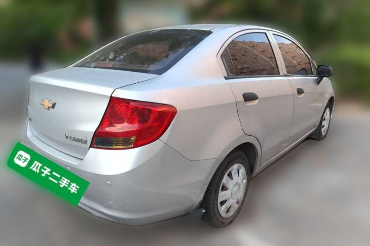 Used Chevrolet Sail 2013 Sedan 1.4L Manual Ideal Happiness Edition Rear Right 45 Deg
