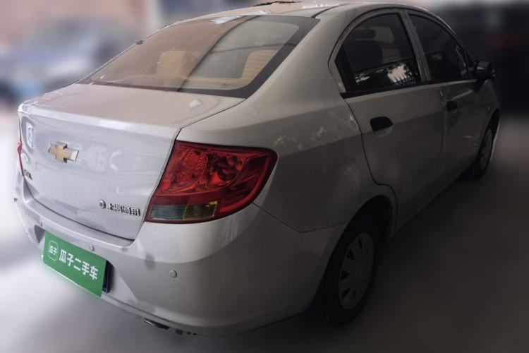 Used Chevrolet Sail 2013 Sedan 1.2L Manual Fashionable Happiness Edition Rear Right 45 Deg