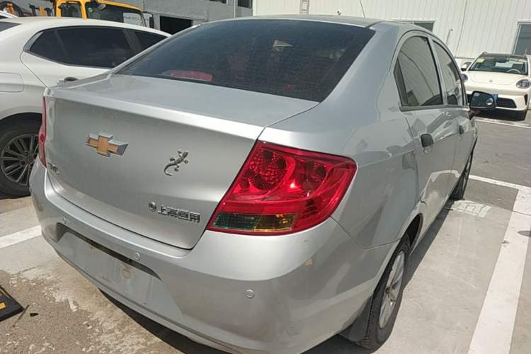 Used Chevrolet Sail 2013 Sedan 1.2L Manual Fashionable Happiness Edition Rear Right 45 Deg