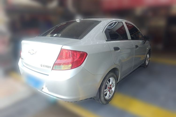 Used Chevrolet Sail 2013 Sedan 1.4L Manual Ideal Edition Rear Right 45 Deg
