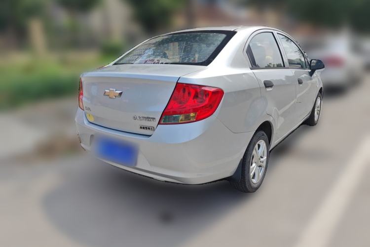 Used Chevrolet Sail 2013 Sedan 1.4L Manual Ideal Edition Rear Right 45 Deg