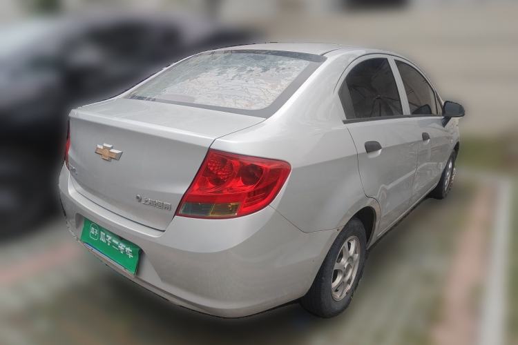 Used Chevrolet Sail 2013 Sedan 1.2L Manual Fashionable Happiness Edition Rear Right 45 Deg