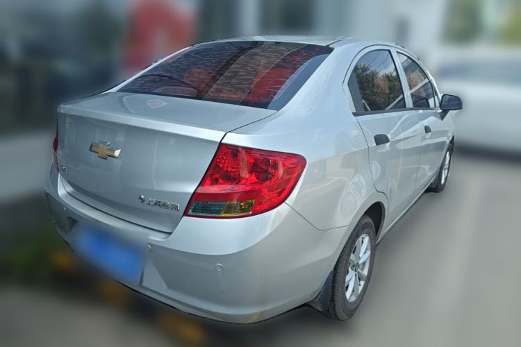 Used Chevrolet Sail 2013 Sedan 1.2L Manual Fashionable Happiness Edition Rear Right 45 Deg