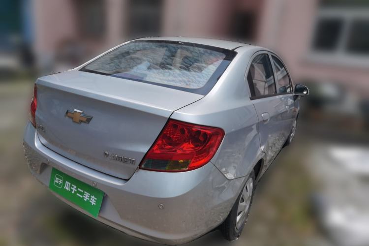 Used Chevrolet Sail 2013 Sedan 1.4L Manual Happiness Edition II Rear Right 45 Deg
