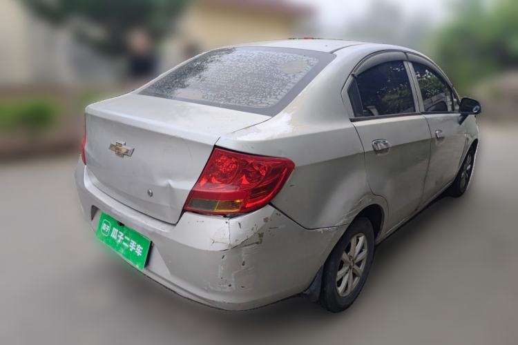 Used Chevrolet Sail 2013 Sedan 1.2L Manual Fashionable Happiness Edition Rear Right 45 Deg
