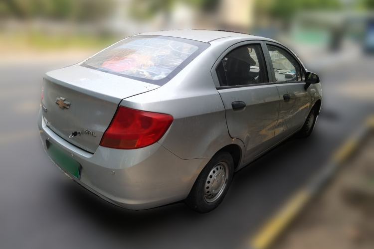 Used Chevrolet Sail 2013 Sedan 1.2L Manual Warm Edition Rear Right 45 Deg