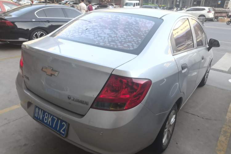 Used Chevrolet Sail 2013 Sedan 1.4L Manual Ideal Happiness Edition Rear Right 45 Deg