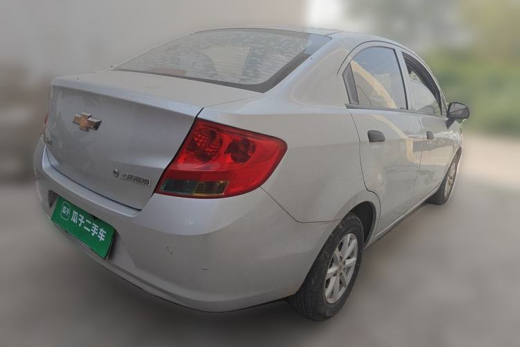 Used Chevrolet Sail 2013 Sedan 1.2L Manual Fashionable Happiness Edition Rear Right 45 Deg