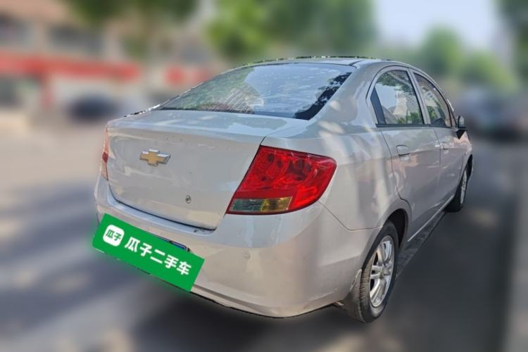 Used Chevrolet Sail 2013 Sedan 1.4L Manual Happiness Edition II Rear Right 45 Deg