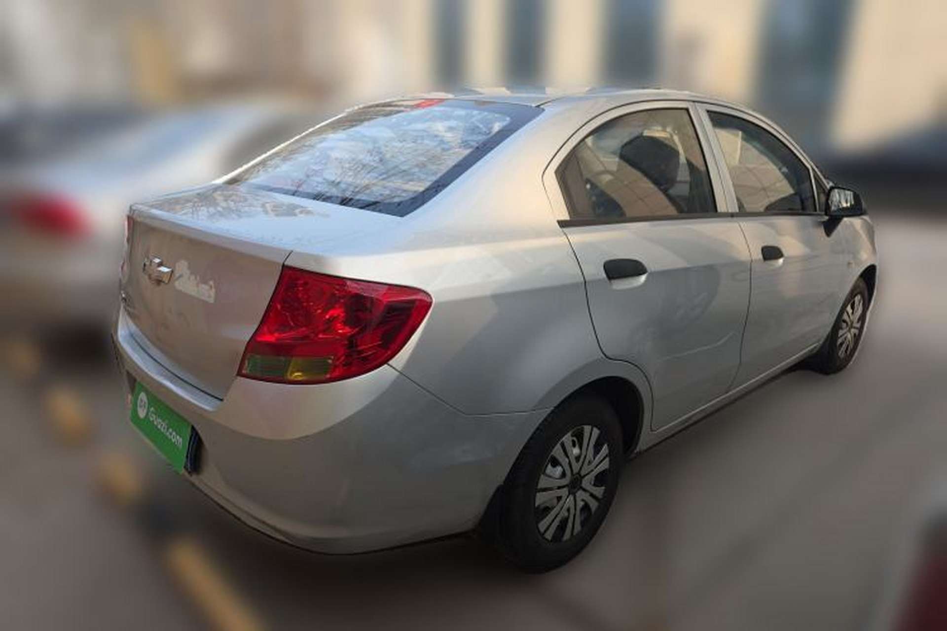 Used Chevrolet Sail 2013 Sedan 1.2L Manual Fashionable Happiness Edition Rear Right 45 Deg