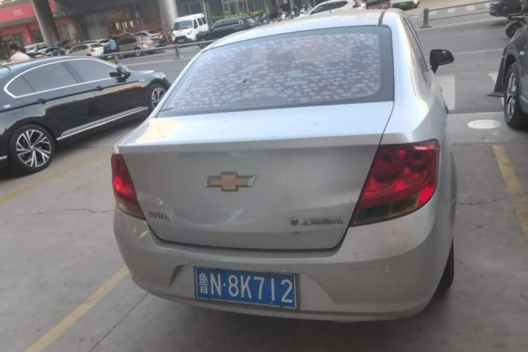 Used Chevrolet Sail 2013 Sedan 1.4L Manual Ideal Happiness Edition Rear