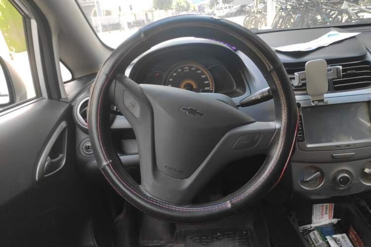 Used Chevrolet Sail 2013 Sedan 1.4L Manual Ideal Happiness Edition Steering Wheel