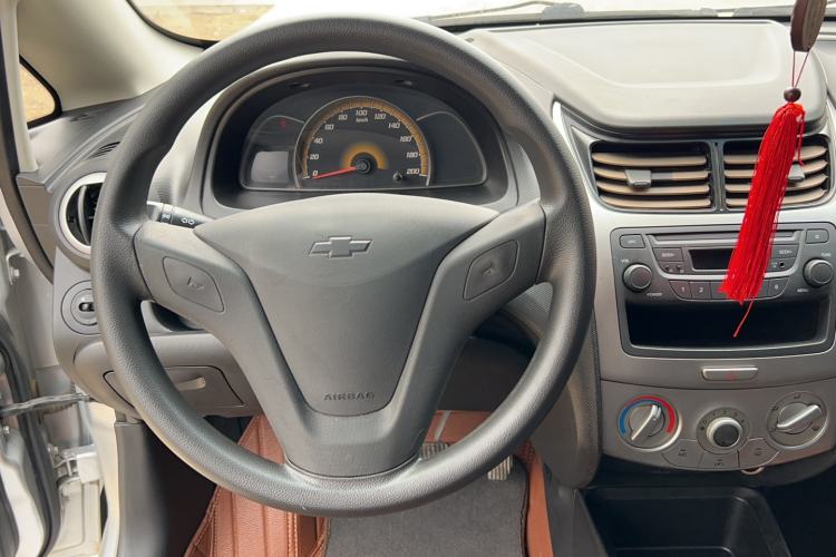Used Chevrolet Sail 2013 Sedan 1.4L Manual Ideal Happiness Edition Steering Wheel