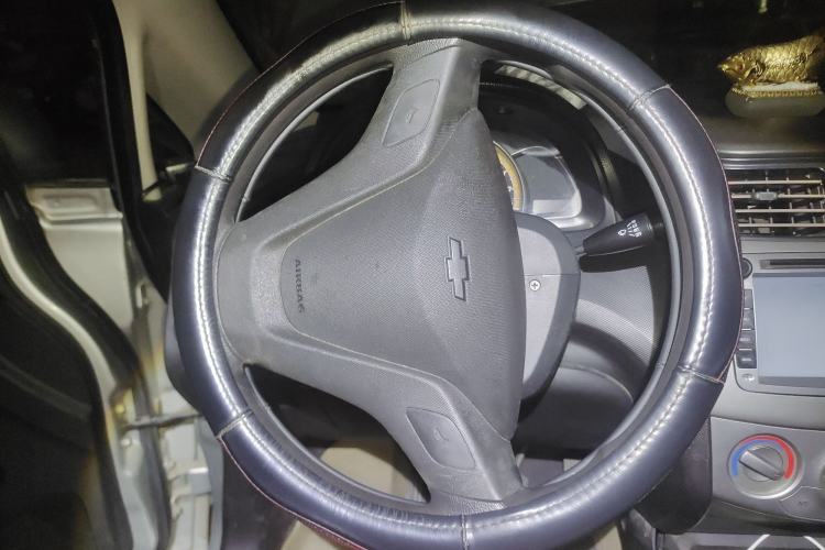 Used Chevrolet Sail 2013 Sedan 1.4L Manual Ideal Happiness Edition Steering Wheel