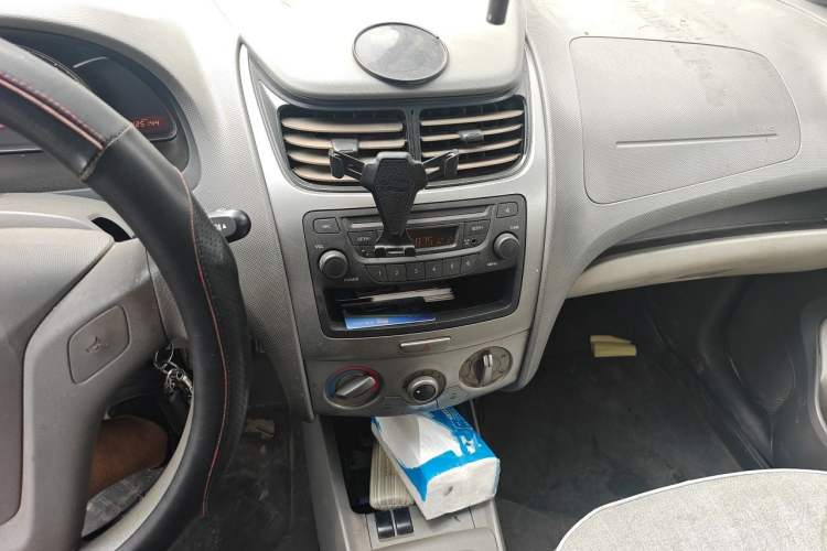 Used Chevrolet Sail 2013 Sedan 1.2L Manual Warm Edition Audio And AC Panel